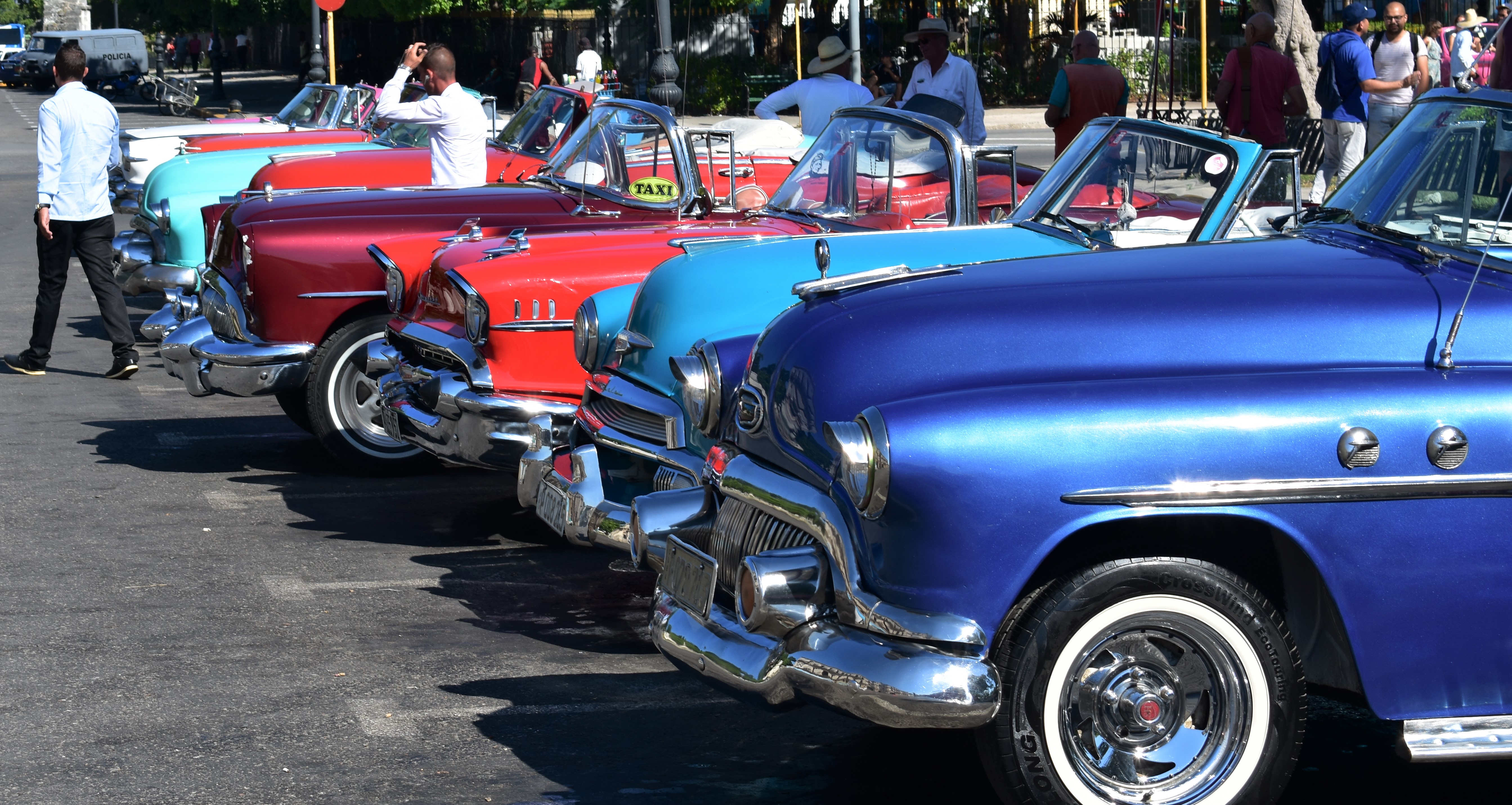 Classic cars line up for tours in Cuba. Photo courtesy of Corey Determan